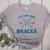 Spring 2024 Season Cute Baseball Mom Here For The Snacks Women's Heather T-Shirt Athletic Heather Spring 2024 Season Cute Baseball Mom Here For The Snacks Women's Heather T-Shirt Athletic Heather