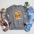 Baby Sloth Open Book Reading Animal Lover Graphic Portrait Raglan Sleeve Sweatshirt Deep Heather