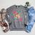 Color Our World Summer Reading 2025 Boho Wildflower Book Raglan Sleeve Sweatshirt Deep Heather