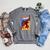 Disney Pixar The Incredibles Omnidroid Comic Book Cover Raglan Sleeve Sweatshirt Deep Heather
