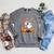 Ghost Reading Book On Swing Halloween Autumn Art Raglan Sleeve Sweatshirt Deep Heather
