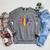 Rainbow Book With Stars And Moon Phases Gay Pride LGBT Raglan Sleeve Sweatshirt Deep Heather