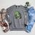 Reading Dinosaur Book Lover Cute Dino Reading Raglan Sleeve Sweatshirt Deep Heather