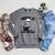 Skeleton Reading Book With Coffee Raglan Sleeve Sweatshirt Deep Heather
