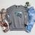 Star Wars The Book Of Boba Fett Chrome Helmet Logo Raglan Sleeve Sweatshirt Deep Heather