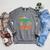 Summer Reading 2026 Dinosaurs Book Lover Unearth A Story Raglan Sleeve Sweatshirt Deep Heather Summer Reading 2026 Dinosaurs Book Lover Unearth A Story Raglan Sleeve Sweatshirt Deep Heather