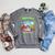 Unearth A Story Dinosaur Books Summer Reading 2026 Raglan Sleeve Sweatshirt Deep Heather