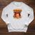 Books Summer Reading 2026 Unearth A Story Dinosaur Raglan Sleeve Sweatshirt Heather Mustard