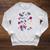 DC Comics Harley Quinn With Textbook Collage Raglan Sleeve Sweatshirt Heather Mustard