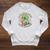 Dino Reading Books Unearth a Story Summer Reading Dinosaur Raglan Sleeve Sweatshirt Heather Mustard