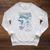 Dungeon Crawler Carl Princess Donut And Mongo Drawing Book Raglan Sleeve Sweatshirt Heather Mustard