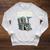 Football Skeleton Reading On Book Stack Raglan Sleeve Sweatshirt Heather Mustard