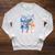 Marvel The Marvels Comic Book Cover 1 Raglan Sleeve Sweatshirt Heather Mustard