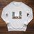 Tired Moms Book Club Coffee Chaos & Chapters Mother's Day Raglan Sleeve Sweatshirt Heather Mustard