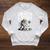 Unearth A Story Astronaut Finds Book On The Moon Raglan Sleeve Sweatshirt Heather Mustard