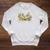 Unearth a Story Dinosaur 2026 Summer Reading Program Book Raglan Sleeve Sweatshirt Heather Mustard Unearth a Story Dinosaur 2026 Summer Reading Program Book Raglan Sleeve Sweatshirt Heather Mustard