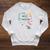 Unearth a Story Dinosaur Book 2026 Summer Reading Program Raglan Sleeve Sweatshirt Heather Mustard Unearth a Story Dinosaur Book 2026 Summer Reading Program Raglan Sleeve Sweatshirt Heather Mustard