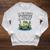 Unearth a Story Frog Reading a Book Summer 2026 Raglan Sleeve Sweatshirt Heather Mustard