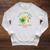 Unearth a Story Summer Reading 2026 Dinosaur Book Kids Raglan Sleeve Sweatshirt Heather Mustard Unearth a Story Summer Reading 2026 Dinosaur Book Kids Raglan Sleeve Sweatshirt Heather Mustard