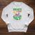 Unearth A Story Summer Reading Program 2026 Animals Book Raglan Sleeve Sweatshirt Heather Mustard