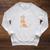 A Woman Cannot Survive On Books Alone She Also Needs Dogs Raglan Sleeve Sweatshirt Heather Mustard