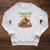 Women's Unearth a Story Summer 2026 Dinosaur Reading Books Dino Raglan Sleeve Sweatshirt Heather Mustard
