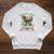 Women's Unearth A Story Summer Reading 2026 Dinosaur Book Floral Raglan Sleeve Sweatshirt Heather Mustard Women's Unearth A Story Summer Reading 2026 Dinosaur Book Floral Raglan Sleeve Sweatshirt Heather Mustard