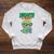Women's Unearth a Story Summer Reading 2026 Triceratops Dino Book Raglan Sleeve Sweatshirt Heather Mustard