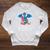 In A World Full Of Bookworms Be A Book Dragon Reading Raglan Sleeve Sweatshirt Heather Mustard