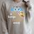A Book A Day Keeps Reality Away Keep Your Day Dream Raglan Sleeve Sweatshirt Heather Forest