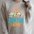 Book Fair King Raglan Sleeve Sweatshirt Heather Forest
