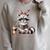 Booktrovert Raccoon Reading Book Iced Coffee Lover Raglan Sleeve Sweatshirt Heather Forest