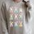 Bunny Reading Books Easter Day Cute Rabbit Librarian Teacher Raglan Sleeve Sweatshirt Heather Forest