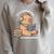 Capybara Reading a Book Cute Reading For Boys Girls Premium Tri-Blend Raglan Sleeve Sweatshirt Heather Forest