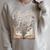 Chapter Forty Book Reading 40th Birthday Flower Raglan Sleeve Sweatshirt Heather Forest