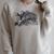 Cheshire Cat Alice In Wonderland Classic Book Premium Tri-Blend Raglan Sleeve Sweatshirt Heather Forest