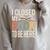 I Closed My Book To Be Here Reading Quote Raglan Sleeve Sweatshirt Heather Forest
