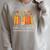 Color Our World Summer Reading 2025 Floral Cute Book Lover Raglan Sleeve Sweatshirt Heather Forest Color Our World Summer Reading 2025 Floral Cute Book Lover Raglan Sleeve Sweatshirt Heather Forest