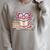 Cute Axolotl Reading Books Cozy Bookworm Fantasy Art Premium Tri-Blend Raglan Sleeve Sweatshirt Heather Forest