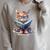 Cute Cat Wearing Glasses Reading a Book Raglan Sleeve Sweatshirt Heather Forest