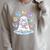 Cute Ghost Reading Books Spooky Magical Tales Witchy Raglan Sleeve Sweatshirt Heather Forest