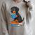 Dachshund Dog With Glasses Reading Book Librarian Raglan Sleeve Sweatshirt Heather Forest