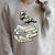 Dark Academia Aesthetic Raven Crow On Old Vintage Books Raglan Sleeve Sweatshirt Heather Forest