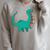 Dinosaur Carrying Book Reading Bookworm Librarian Raglan Sleeve Sweatshirt Heather Forest