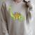 Dinosaur Librarian Book Lover Reading Brontosaurus Raglan Sleeve Sweatshirt Heather Forest