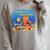 Dive Into a Good Book Reading Pun Raglan Sleeve Sweatshirt Heather Forest