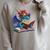 Dragon Wearing Glasses Reading A Book Raglan Sleeve Sweatshirt Heather Forest