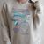 Dungeon Crawler Carl Princess Donut And Mongo Drawing Book Raglan Sleeve Sweatshirt Heather Forest