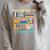 Easily Distracted By Cats And Books Cat Book Lovers Bookworm Raglan Sleeve Sweatshirt Heather Forest