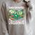Easily Distracted By Coffee Books And Dragons Fantasy Sci-Fi Raglan Sleeve Sweatshirt Heather Forest